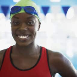 Smiling woman getting ready for a swim